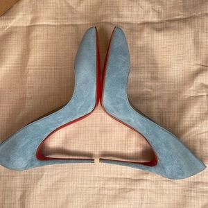 Christian Louboutin
Blue Suede Pigalle Follies Size 39.5 Pumps.